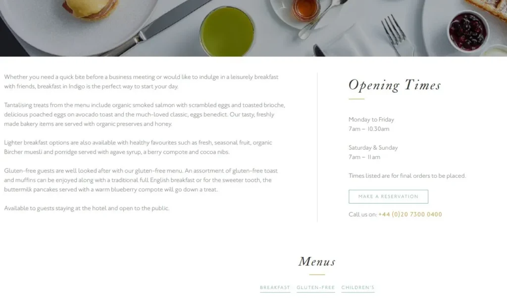 Hotel breakfast page with opening times, reservation button and menu information